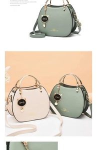 Detailed shot of cat-themed shell bags with golden ring handles and cute charms