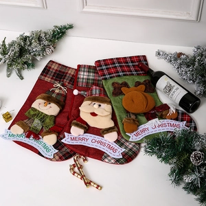Christmas stocking gift bags set with 3D Santa, Snowman, and Reindeer holiday decorations