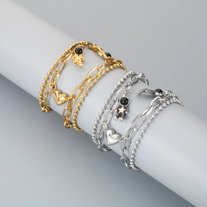 Close-up of double-layer magnetic couples bracelets with astronaut and heart charms