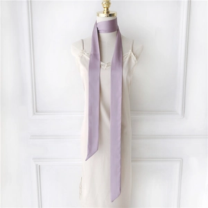Lavender purple satin skinny scarf tied on a mannequin with French elegant styling