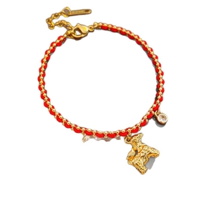 Handwoven red rope bracelet with golden beads and mythical beast horse charm