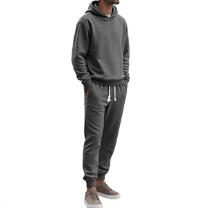 Men's dark grey hooded tracksuit with textured jacquard pattern and drawstring pants