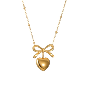 Elegant gold bow and heart pendant necklace in titanium steel on a white background
