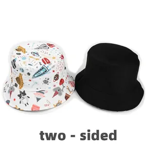 Reversible bucket hat with cartoon space patterns and black side for sun protection