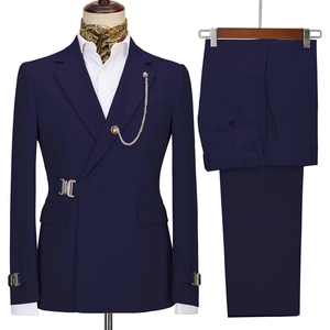 Slim fit navy blue double-breasted suit with metal chain brooch and waist buckle
