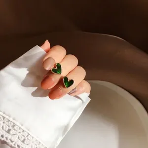 Vintage dark green heart stud earrings with gold trim on S925 silver needles
