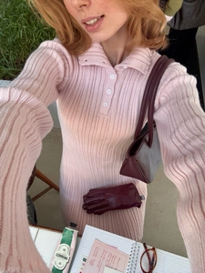Pink knit polo collar long sleeve mini dress styled with a burgundy leather shoulder bag