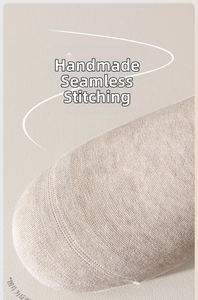 Macro detail of seamless toe stitching on the inside of premium cotton socks