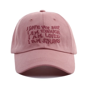 Pink cotton baseball cap with embroidered letter quote and classic six-panel design