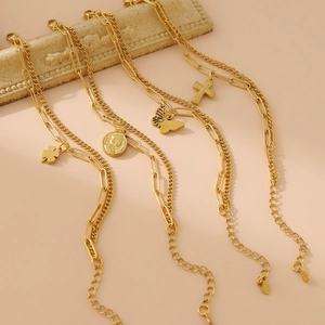 Bracelet double couche en acier inoxydable doré avec trèfle, pièce, papillon et pendentif croix