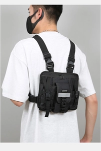 Tactical vest bag with reflective safety strip and Molle system shown on model back