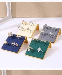Detail of 4-slot velvet ring display stand with metal frame in various premium colors