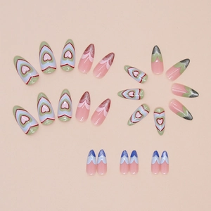 Almond-shaped press-on nails with cat eye heart patterns and pink glitter finish