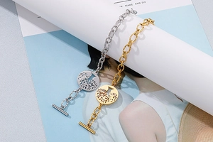 Detail of Tree of Life bracelet in gold and silver with T-bar OT toggle clasp closure