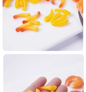 Detailed view of miniature realistic resin shrimp tails for DIY crafts and decor