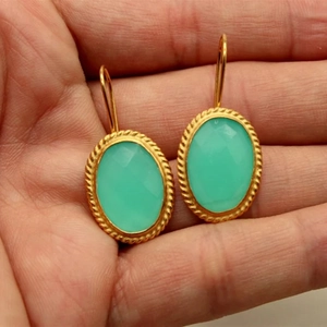 Elegant vintage oval mint green crystal earrings with twisted gold frame dangles