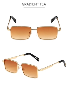 Detail of square gold metal sunglasses frame with brown gradient lenses and slim temples