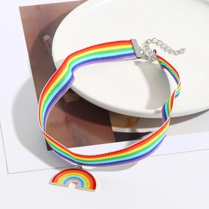 Detail of colorful rainbow choker with heart pendant and metallic adjustable chain