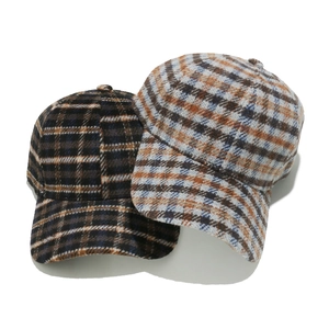 Classic plaid wool baseball caps in dark and light checkered patterns for autumn and winter
