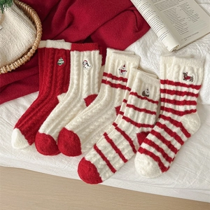 Five pairs of thick warm red and white Christmas socks with holiday embroidery set