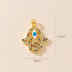 Detailed view of gold Hamsa hand pendant with colorful zircons, size 2.5cm by 1.8cm