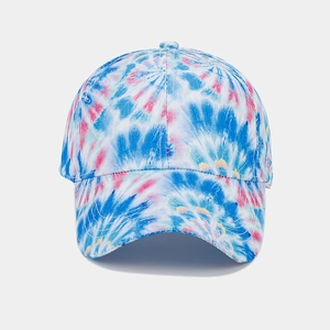 Front view of a vibrant blue and pink tie-dye baseball cap with twill texture