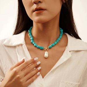 Vintage S925 silver necklace with baroque pearl and turquoise beads on model