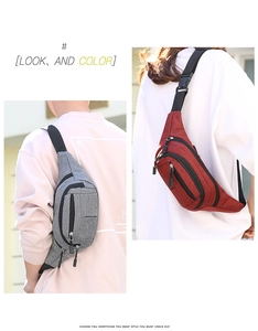 Detail of multi-pocket zippers and adjustable plastic buckle on the gray chest bag