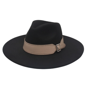 Close-up of classic black wide brim fedora hat with beige faux leather belt and silver buckle