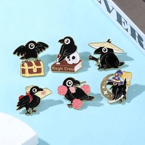 Detailed set of six black crow enamel pins featuring magic and warrior crow motifs