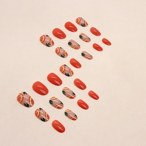 Summer orange grapefruit press-on nails with oval shape and citrus fruit art patterns