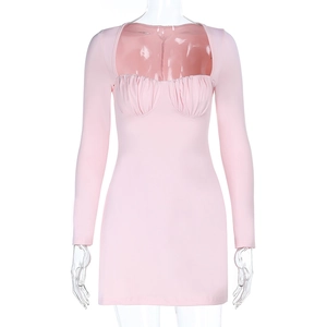 Detail of pink long sleeve dress featuring square neckline and elegant ruched bust design