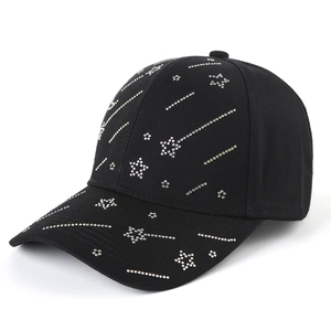 Black cotton baseball cap with silver rhinestone star pattern in a 45-degree side view