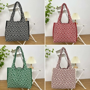 Large knit jacquard tote bags in four colors hanging on chairs for casual fashion style
