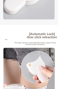 Détail du ruban à mesurer blanc avec courbe ergonomique et bouton de rétraction