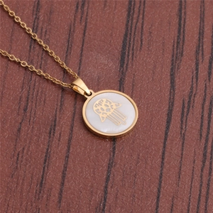 Gold Hamsa Hand pendant necklace on white mother of pearl with stainless steel chain