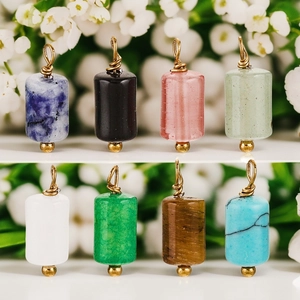 Set of 8 colorful cylindrical natural stone pendants with gold-plated metal hoops