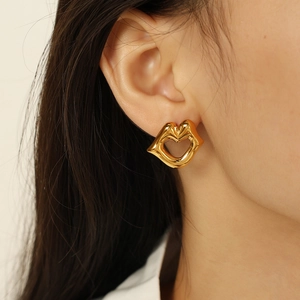 Fashionable hollow lip-shaped gold earrings in 18K plated titanium steel for women