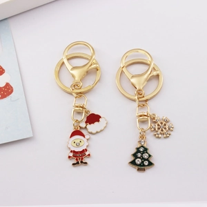 Christmas keychain set with Santa Claus and snowflake tree charms in gold finish