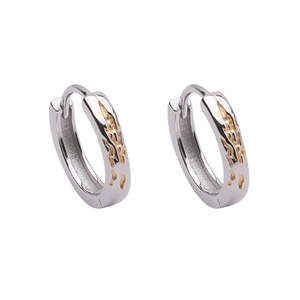Polished silver earrings with golden flame patterns in a minimalist ring style