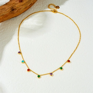 Detail of gold-plated stainless steel chain with colorful heart-shaped stone pendants