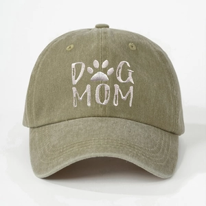 Detail of DOG MOM and paw print white embroidery on washed cotton baseball cap