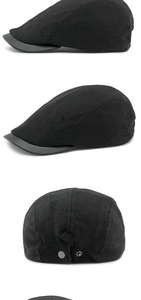 Detail of wool flat cap with leather brim showing back metal snap closure and texture