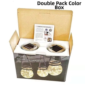 Unboxing detail of solar crackle glass hanging lights in dual-pack set with packaging