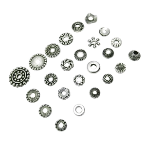 Assorted silver alloy spacer beads in various geometric shapes for DIY jewelry making
