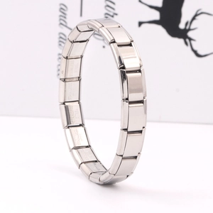 Polished stainless steel modular link bracelet featuring removable rectangular metal pieces