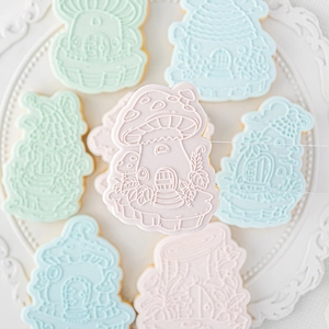 Mushroom house embossed cookie cutters and fondant molds for forest theme cake decorating