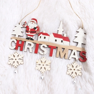Wooden Christmas hanging sign with Santa and cedar elements on a white plush background
