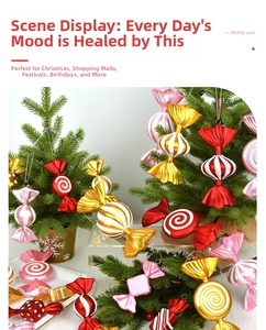 Close-up of multicolored electroplated candy-shaped ornaments on a Christmas tree