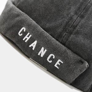 Washed cotton Miki Hat in black with white CHANCE embroidery in a retro street style